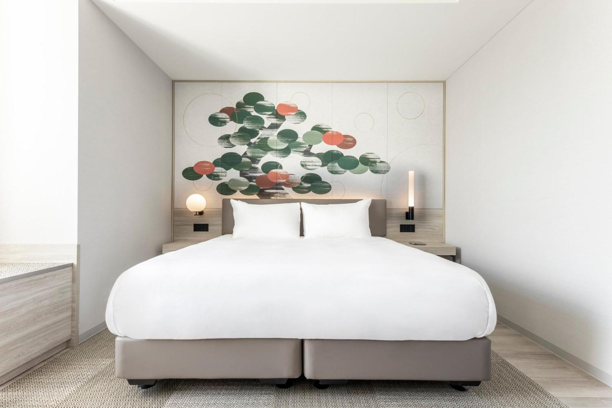 Centara Grand Hotel Osaka Exterior photo A bedroom at The Standard East Village